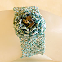 BRACCIALETTI PERLINE CON ROSONE