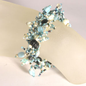 BRACCIALI CORALLO CON PERLE IN VETRO - Image 3