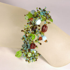 BRACCIALI CORALLO CON PERLE IN VETRO - Image 8