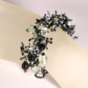 BRACCIALI CORALLO CON PERLE IN VETRO - Image 24