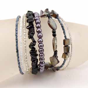 BRACCIALI RIGIDINI CON PERLE IN CERAMICA - Image 11