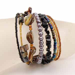 BRACCIALI RIGIDINI CON PERLE IN CERAMICA - Image 15