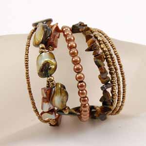 BRACCIALI RIGIDINI CON PERLE IN CERAMICA - Image 17