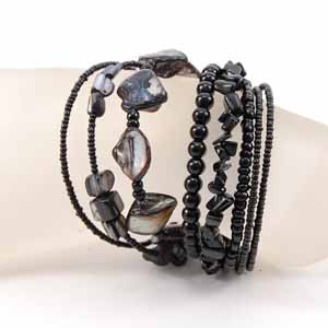 BRACCIALI RIGIDINI CON PERLE IN CERAMICA - Image 19