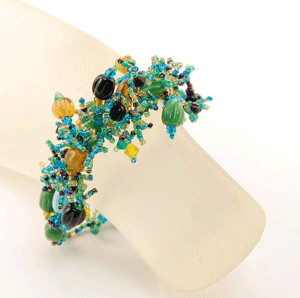 BRACCIALI CORALLO CON PERLE IN VETRO - Image 28