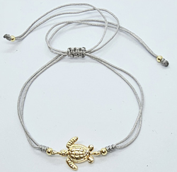 BRACCIALE IN  CORDINO CON TARTARUGA MARINA GOLD PLATED