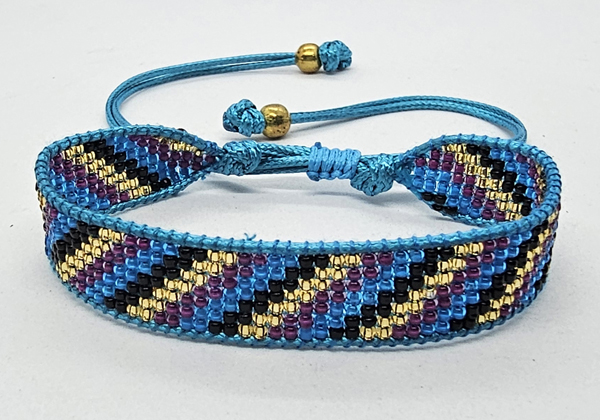 BRACCIALE CON PERLINE GIAPPONESI MATZUNO 15/0 LAVORAZIONE A TELAIO CON CORDINO COREANO, CHIUSURA A MACRAMÉ REGOLABILE (7 ROW) 9 LINEE - Image 10